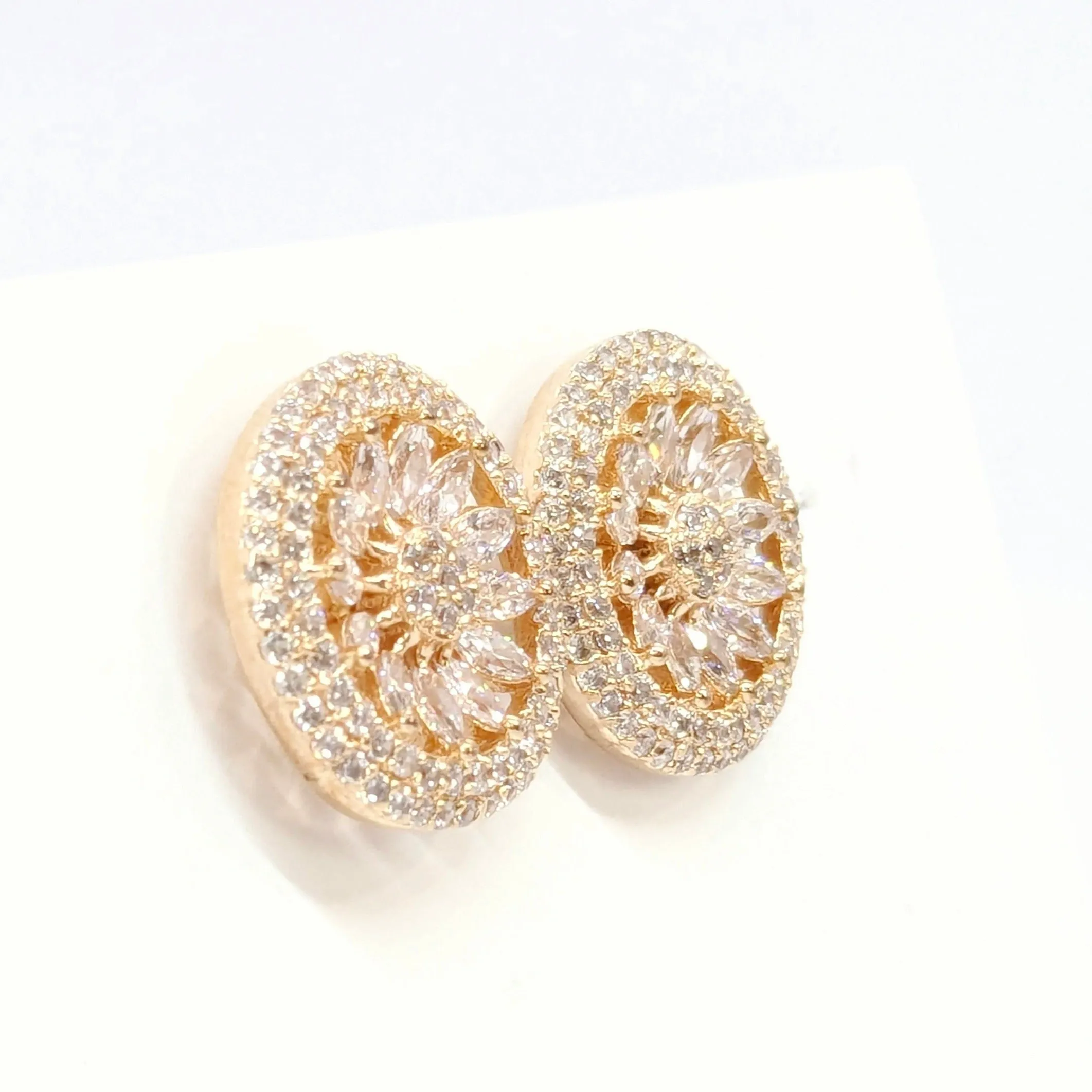 American Diamond Studded Earrings - Round Shape With Gold Finish.