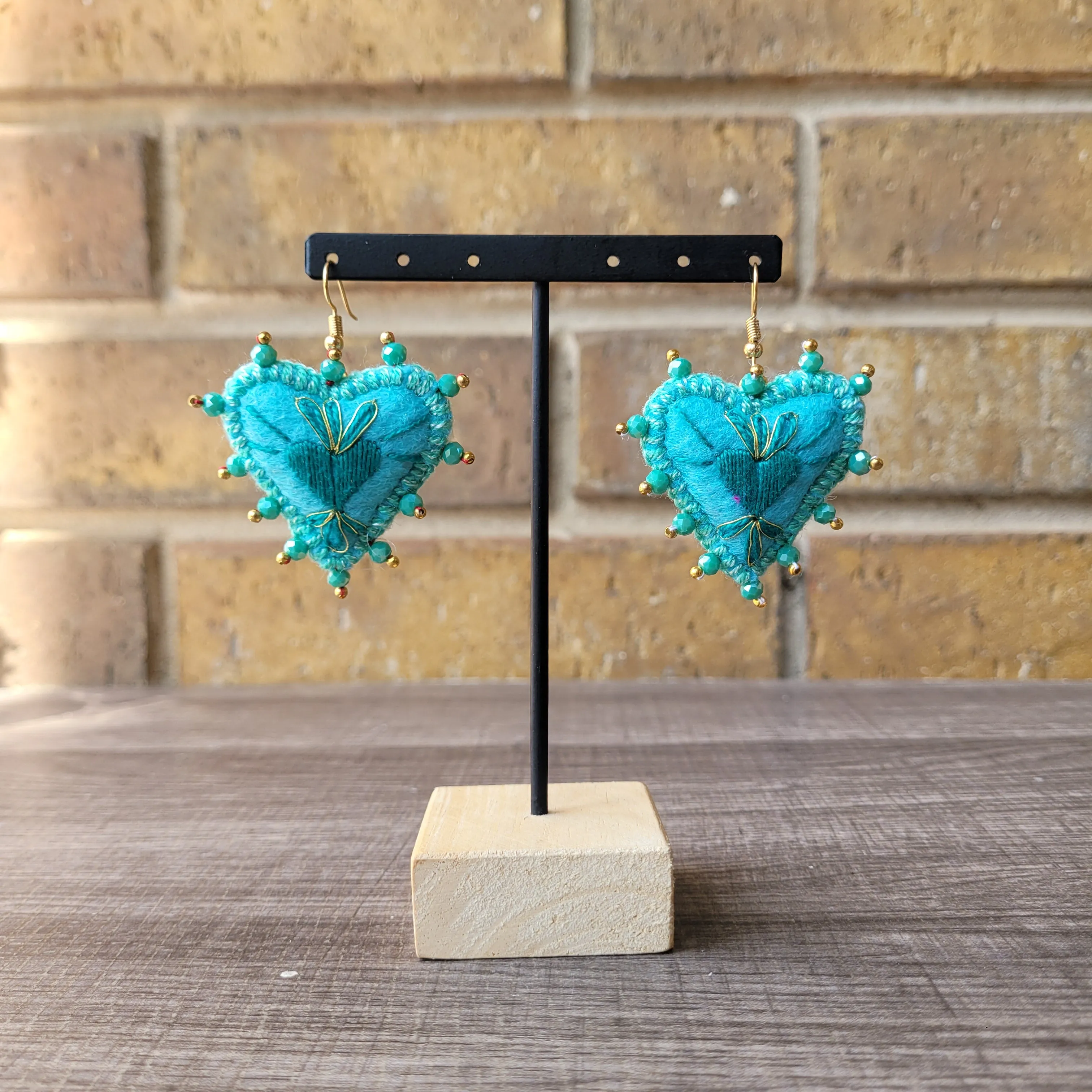 Turquoise sagrado corazon embroidered earrings